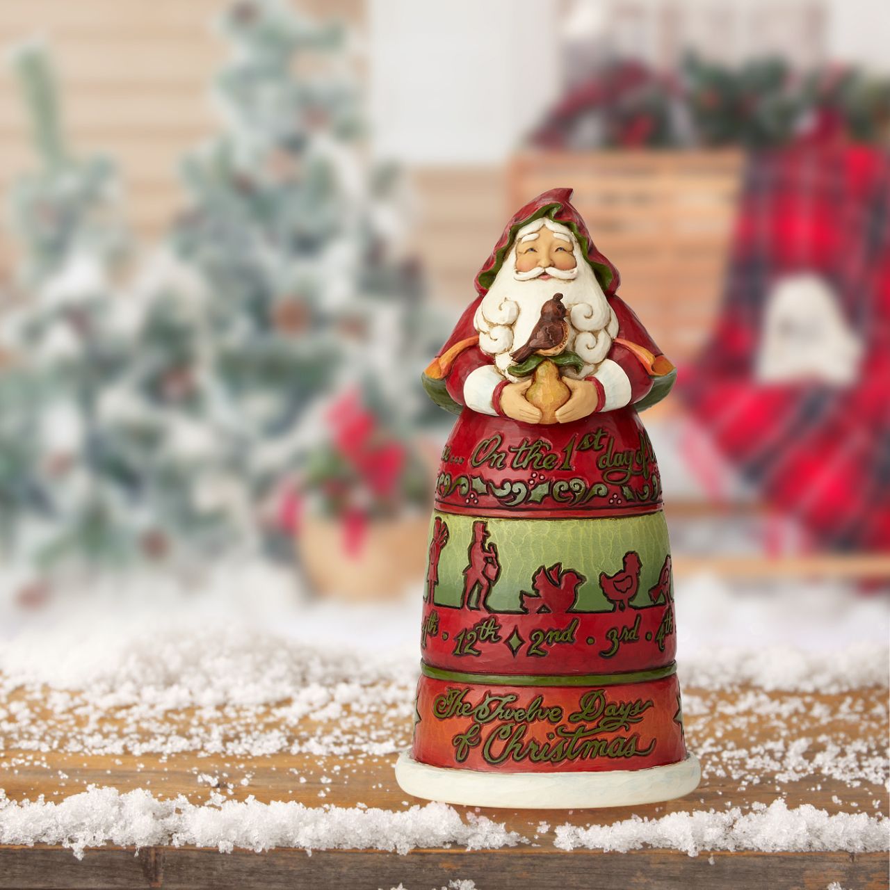 Jim Shore Heartwood Creek Offerings From The Heart  Heartwood Creek 12 Days of Christmas Santa is made of hand painted resin, wood style. Heartwood Creek Collection created by the American artist Jim Shore. 