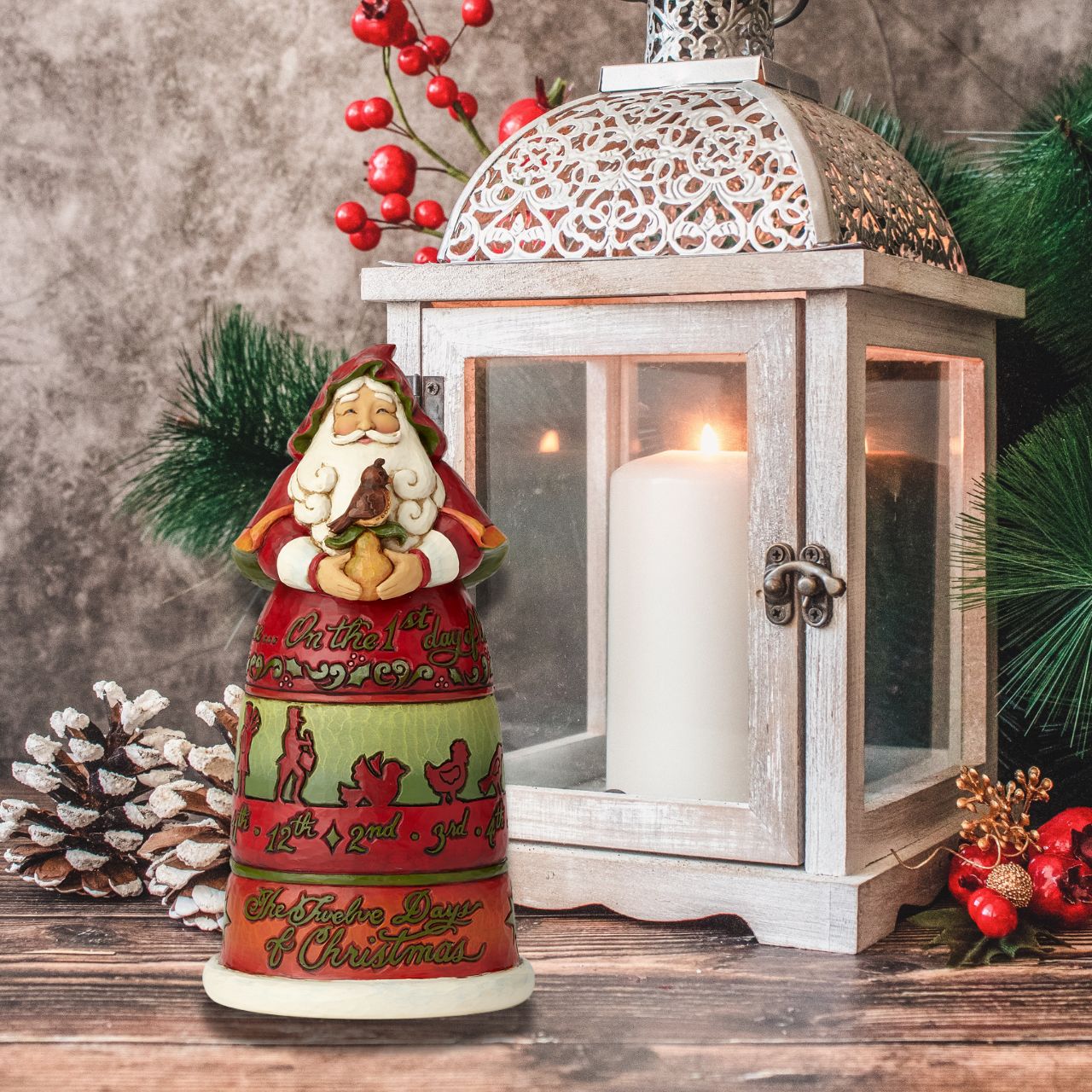 Jim Shore Heartwood Creek Offerings From The Heart  Heartwood Creek 12 Days of Christmas Santa is made of hand painted resin, wood style. Heartwood Creek Collection created by the American artist Jim Shore. 