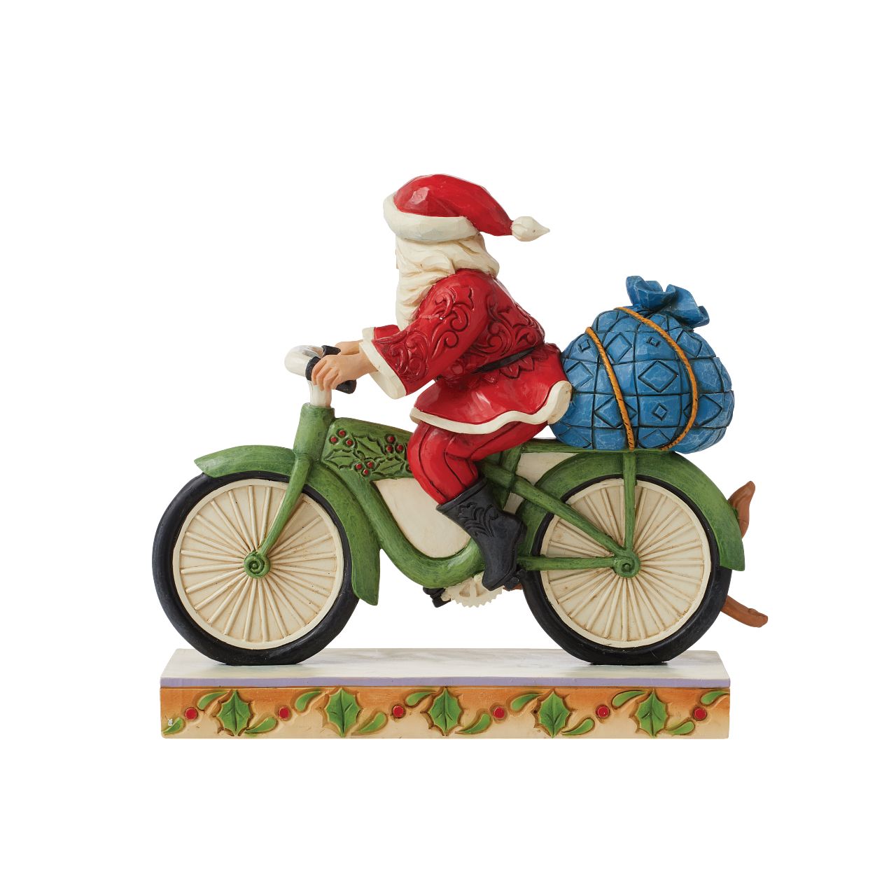 Jim Shore Heartwood Creek Santa Riding Bike Figurine  Traditional Heartwood Creek Collection; Wood carved textures and intricately detailed designs. Unique, sometimes surprising combinations of colours - often incorporating a touch of Jim's favourite colour - purple. Here we have Santa riding a bike with his trusty canine friend by his side.