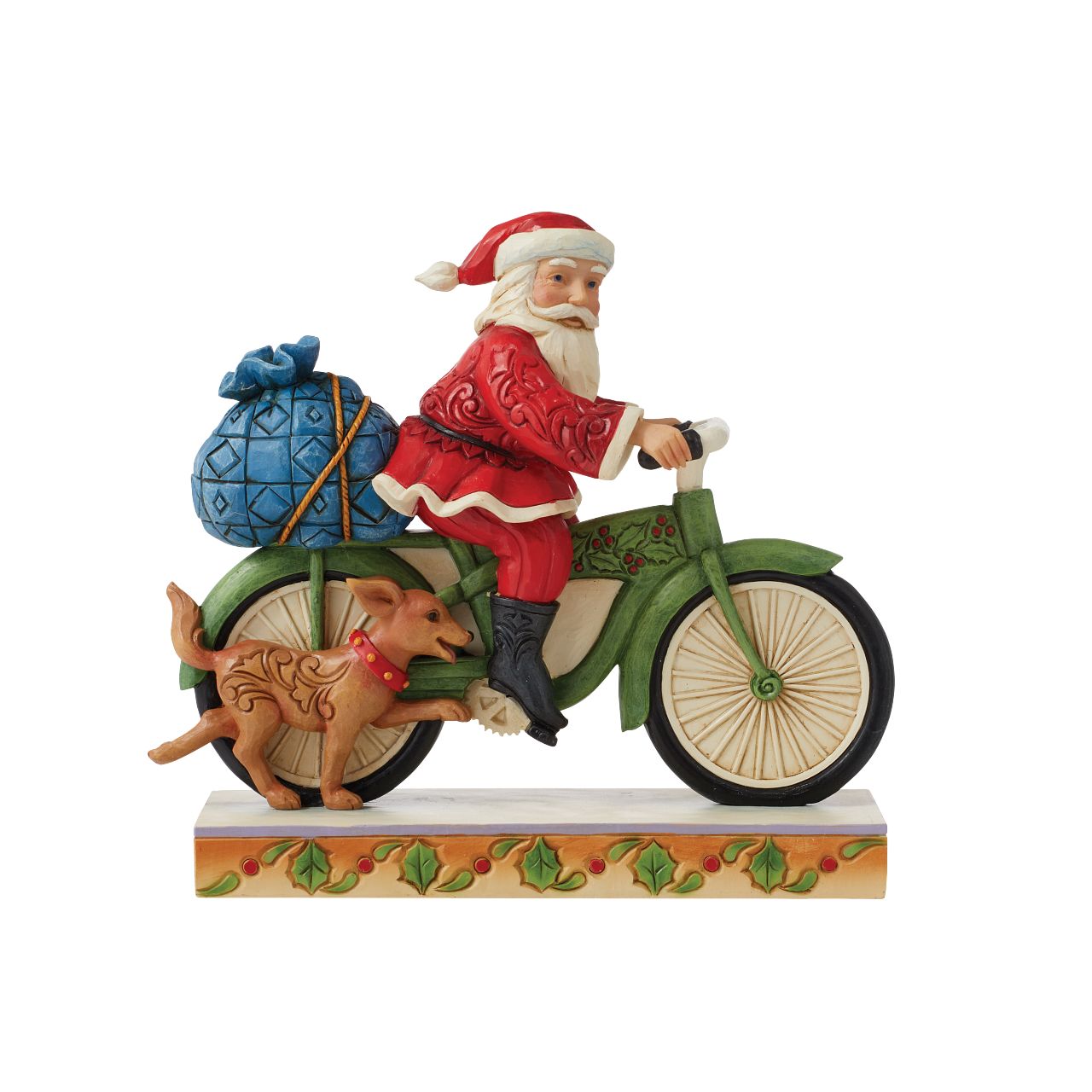 Jim Shore Heartwood Creek Santa Riding Bike Figurine  Traditional Heartwood Creek Collection; Wood carved textures and intricately detailed designs. Unique, sometimes surprising combinations of colours - often incorporating a touch of Jim's favourite colour - purple. Here we have Santa riding a bike with his trusty canine friend by his side.