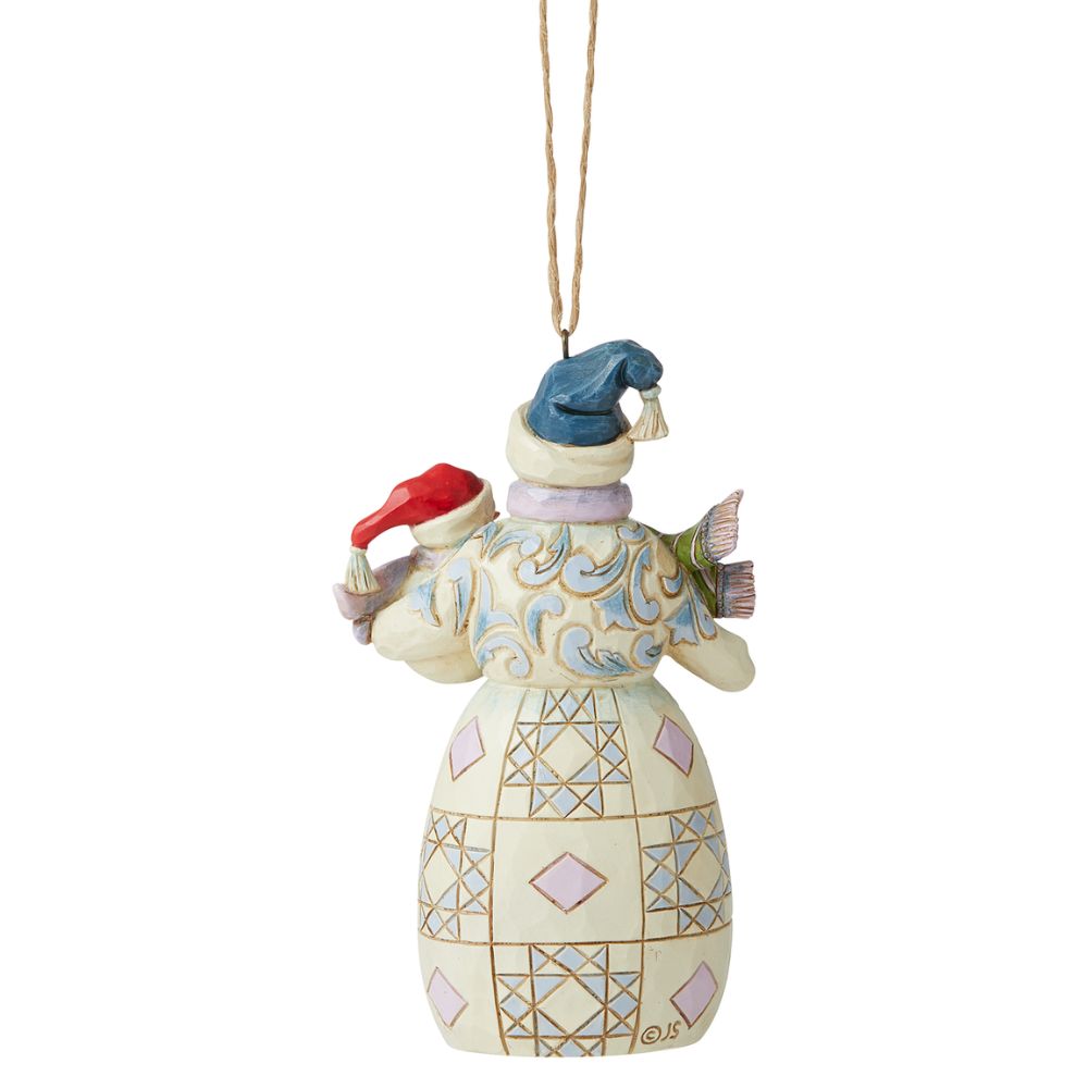 Jim Shore Heartwood Creek Snowman with Baby Hanging Ornament  Designed by award-winning artist and sculptor Jim Shore for Heartwood Creek. Ornament hangs by jute rope and features a handcrafted look. Item is packed in a branded craft box. Unique variations should be expected as product is hand painted. Not a toy or children's product. Intended for adults only.