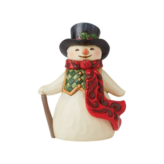 Jim Shore Heartwood Creek Snowman with Long Scarf Mini Figurine  This mini Snowman is the ideal addition to any Heartwood Creek collection. Hand-painted with intricate details, styled in the iconic Jim Shore style, each piece comes in a Kraft box witha product image on the side, for easy storage, display and gifting.