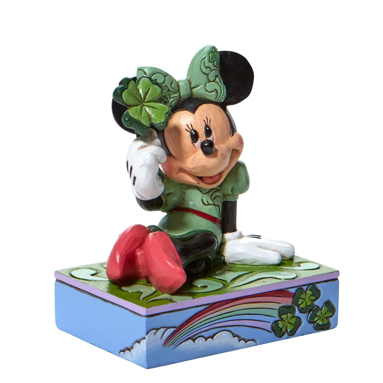 St. Patrick's Minnie Mouse Personality Pose Figurine  "Shamrock Wishes" Luck be a lady, Minnie Mouse is the pot of gold at the end of this Walt Disney rainbow! Dressed in an amorous emerald gown, the kittenish mouse holds a clover for you this St. Patrick's Day. With matching bow and base, this Jim Shore design is a charmer.