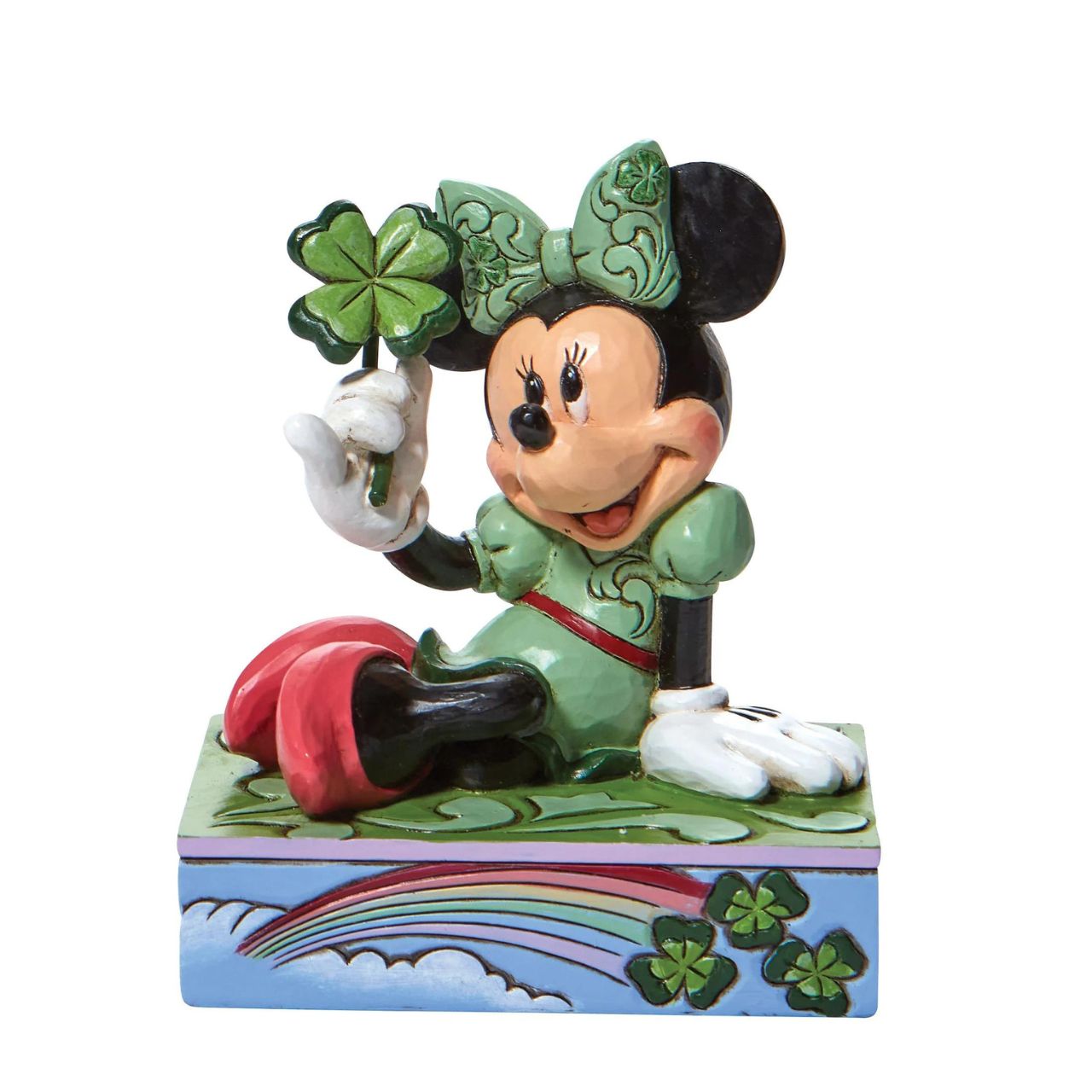 St. Patrick's Minnie Mouse Personality Pose Figurine  "Shamrock Wishes" Luck be a lady, Minnie Mouse is the pot of gold at the end of this Walt Disney rainbow! Dressed in an amorous emerald gown, the kittenish mouse holds a clover for you this St. Patrick's Day. With matching bow and base, this Jim Shore design is a charmer.