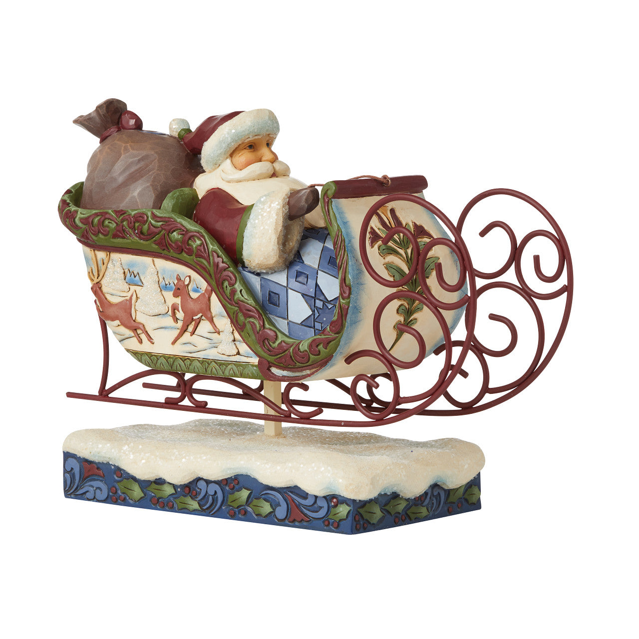 Jim Shore Victorian Christmas Santa in Sleigh Figurine  "Flight of Festive Fancy" Cozy in his sleigh, Santa steers from the comfort of a blanket while his cargo of presents rests behind him. Levitating above the snow with the help of reindeer and magic, this Jim Shore Santa delights and mystifies all season long.