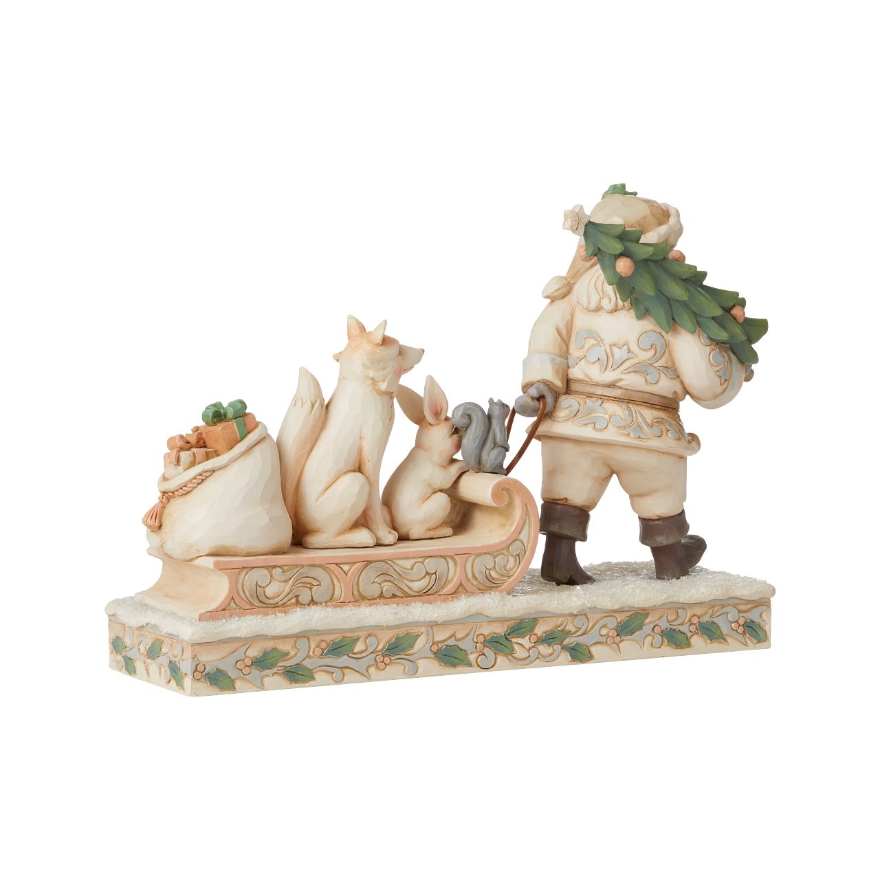 Jim Shore White Woodland Santa Pulling Sled Figurine  "A Wandering We Go" Santa is getting ready for Christmas with his furry friends. This piece features Santa dressed in the iconic, muted colours of White Woodland, whilst pulling a sled of forest animals and gifts.