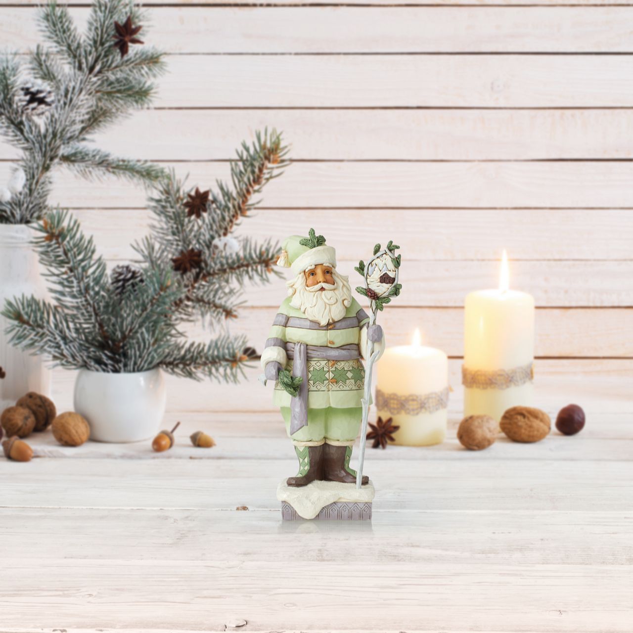 White Woodland Woodsy Santa Figurine  The White Woodland Collection showcases Intricate Jim Shore designs, with soft neutral colour palette suitable for many styles of home décor. This stunning woodsy Santa is the perfect addition to any White Woodland Collection.