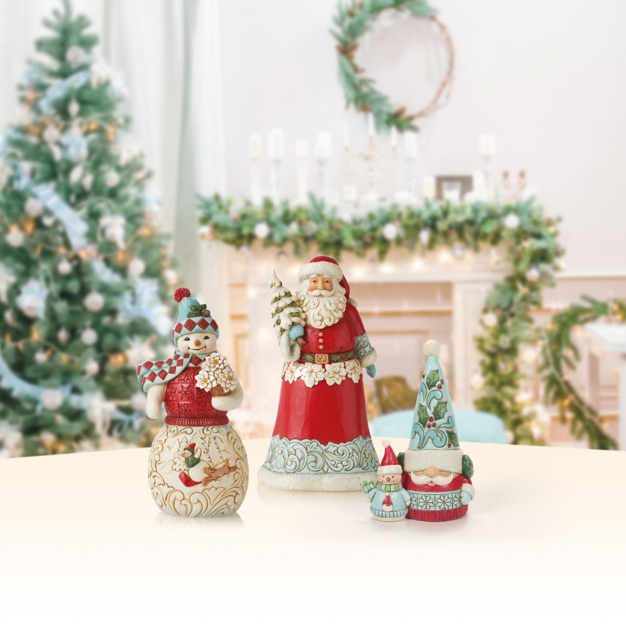 Winter Wonderland Collection Snowman with Sledding Scene Figurine  Winter Wonderland Collection; Bright jewel tones, metallic shimmering and pearlized finishes and coloured glitter accents. This beautiful glittering Snowman has a delightful scene on his belly and will brighten any room.