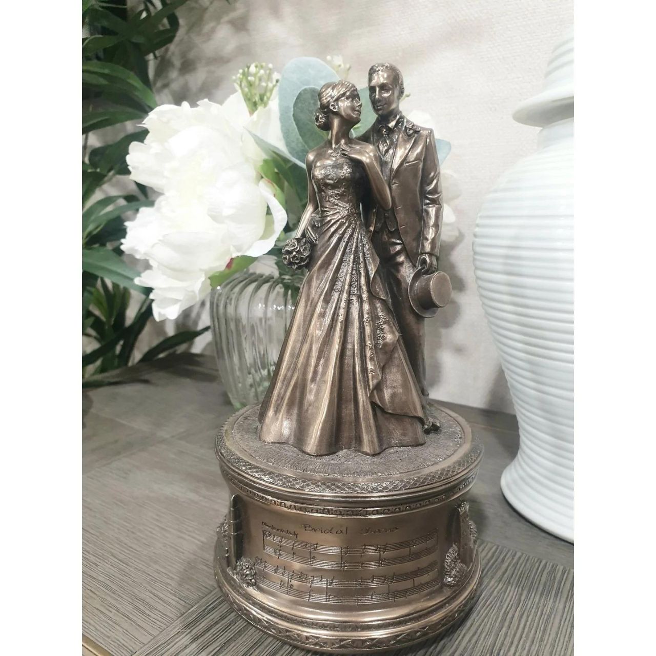 Just Married Music Box by Genesis  Genesis Fine Arts has evolved into a much loved and world famous Irish brand to produce a striking range of handcrafted cold cast bronze sculptures.  - Genesis Ireland Wedding Gift.