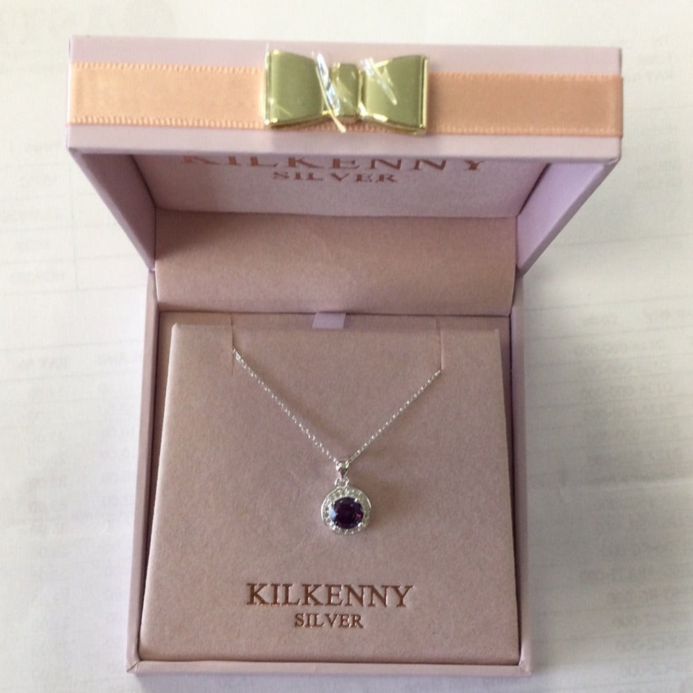 Kilkenny Silver Amethyst Stone Round Pendant  Sterling silver amethyst coloured pendant with clear coloured cubic zirconia stones. Price includes 16 or 18 inch chain.