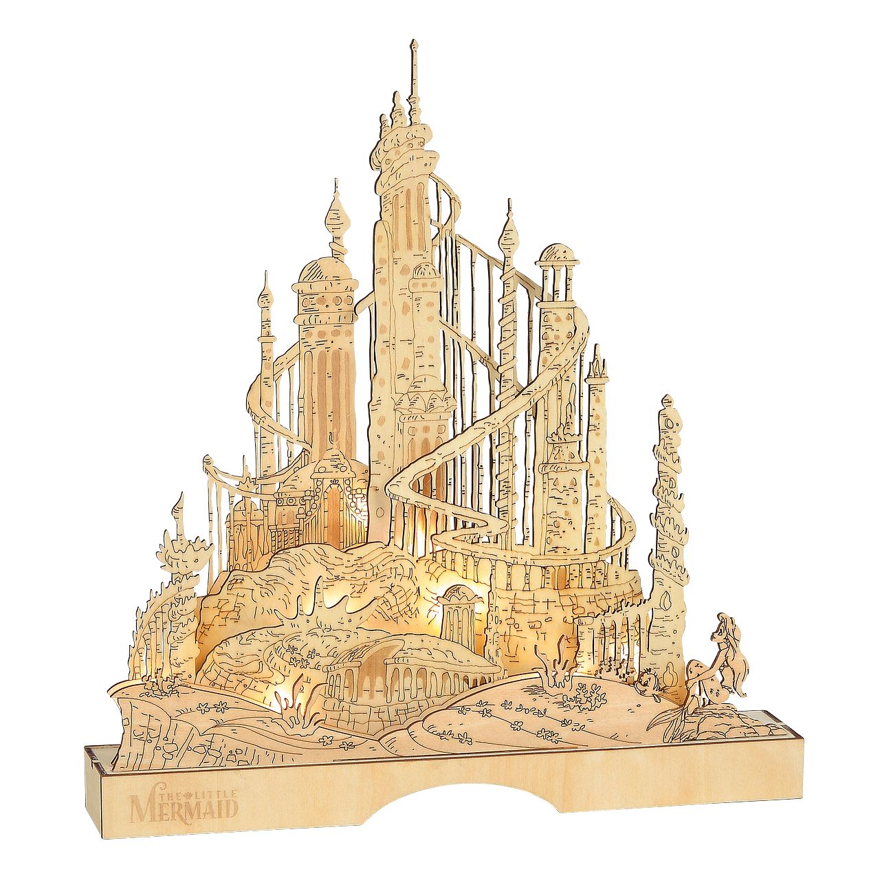 King Triton Illuminated Palace - The Little Mermaid  Ariel can be seen gazing up to her Father's Palace as it lights up the Atlantica Kingdom. The natural elements of the Basswood are carefully crafted and layered to build a multidimensional King Trition's Palace. 