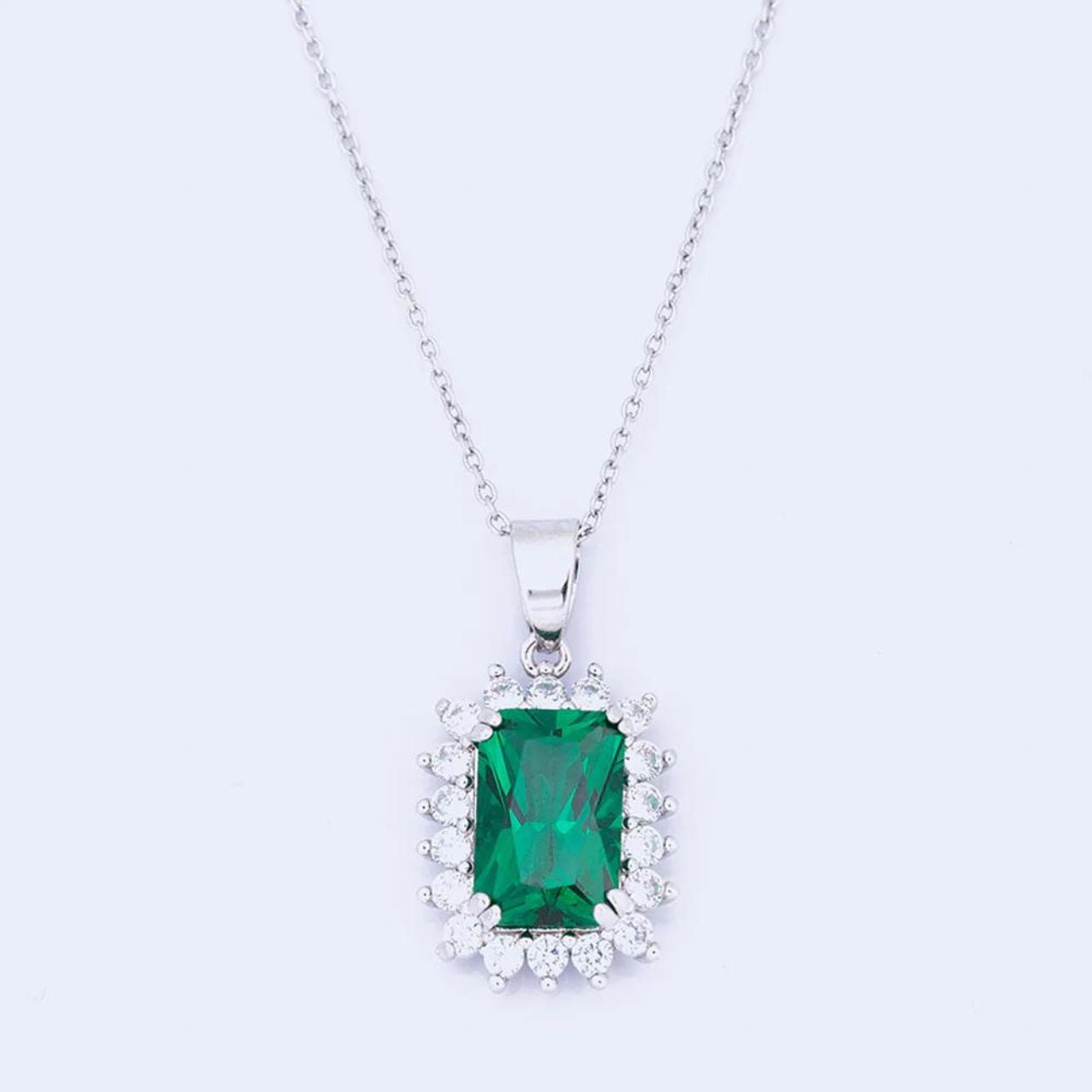 Knight & Day Classic Emerald Pendant  Classic style pendant with beautiful emerald CZ centre stone. Rhodium plating.  Length 42 + 5cm extension.