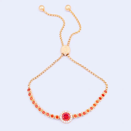 Knight & Day Classic Red Bracelet  Classic style bracelet embellished with red CZ stones. Slider fastening. Gold plating.