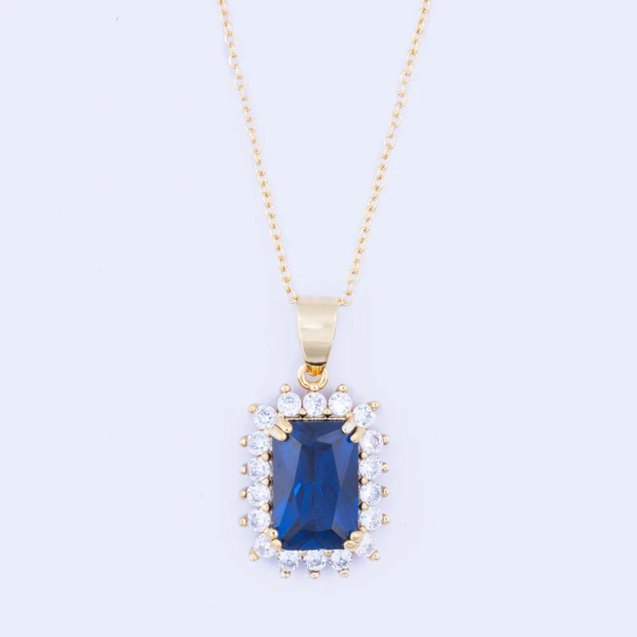 Knight & Day Classic Sapphire Pendant  Classic style pendant with beautiful sapphire CZ centre stone. Gold plating.  Length 42 + 5cm extension.