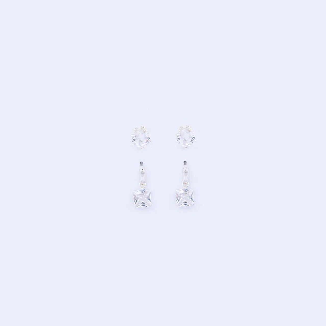 Duo Silver Earring Set by Knight & Day  Duo silver earring set, embellished with CZ stones. Ideal for stacking or can be worn separately. Stud fastening. Silver plating.