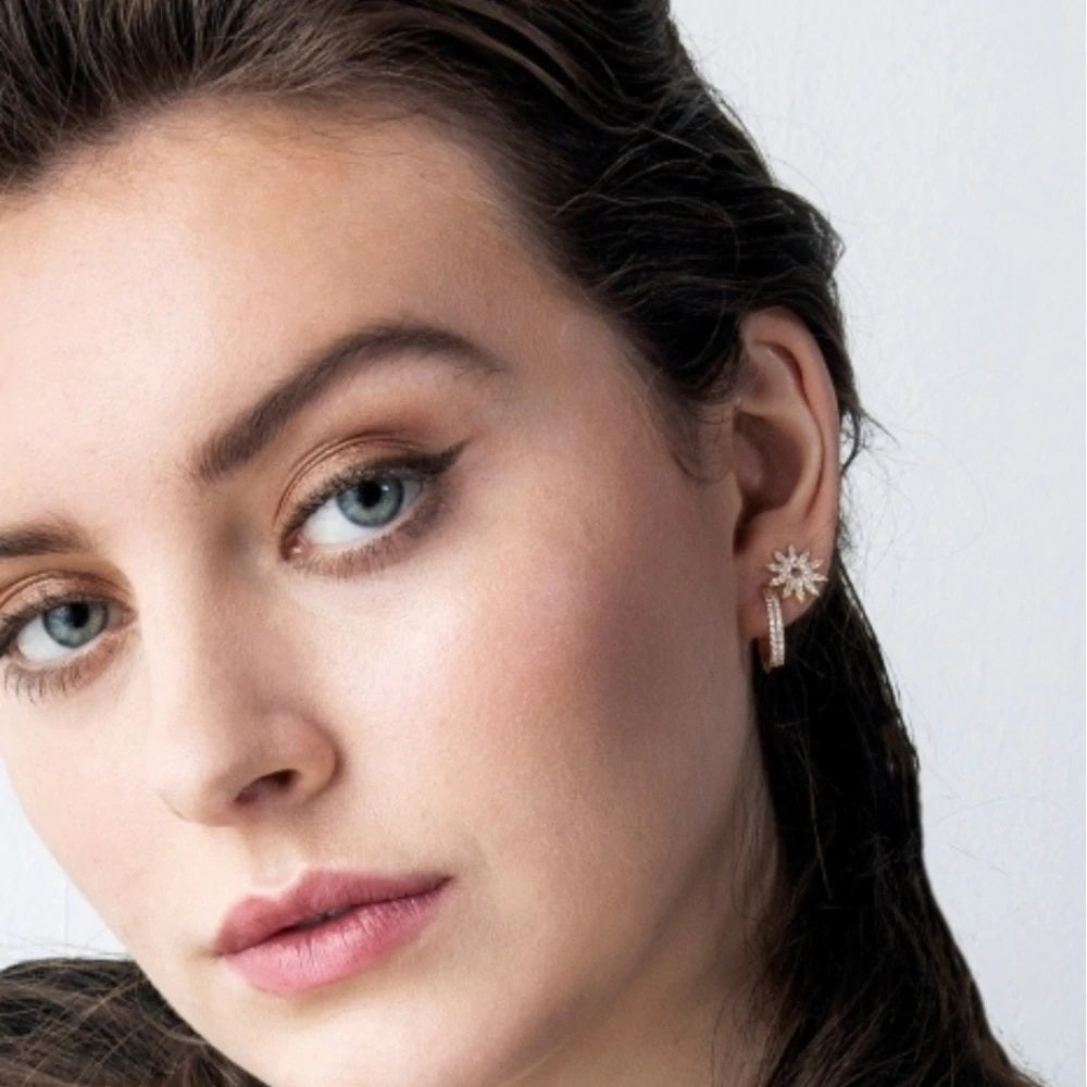 Knight & Day Nevaeh Rhodium Earrings Huggie style hoops (12mm) embellished with clear CZ stones.  Rhodium plating.