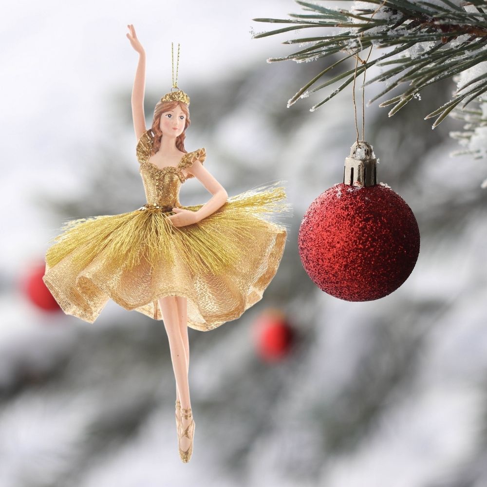 Kurt S Adler Gold Ballerina Christmas Ornament - High Arm  Kurt Adler's gold ballerina ornaments are a beautiful addition to your home or holiday décor. Ballerinas wearing gold with tinsel accents, a gold glittered crown and gold ballet shoes.