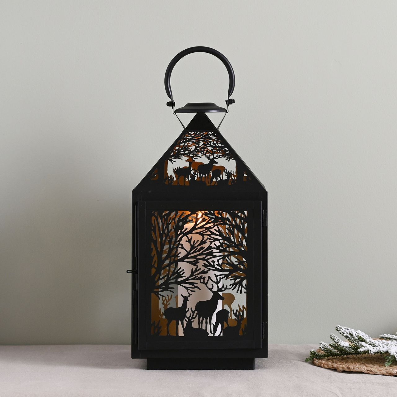 Stag Silhouette Christmas Lantern Square  A square stag silhouette lantern.  This enchanting lantern glistens with festive charm throughout the Christmas period.