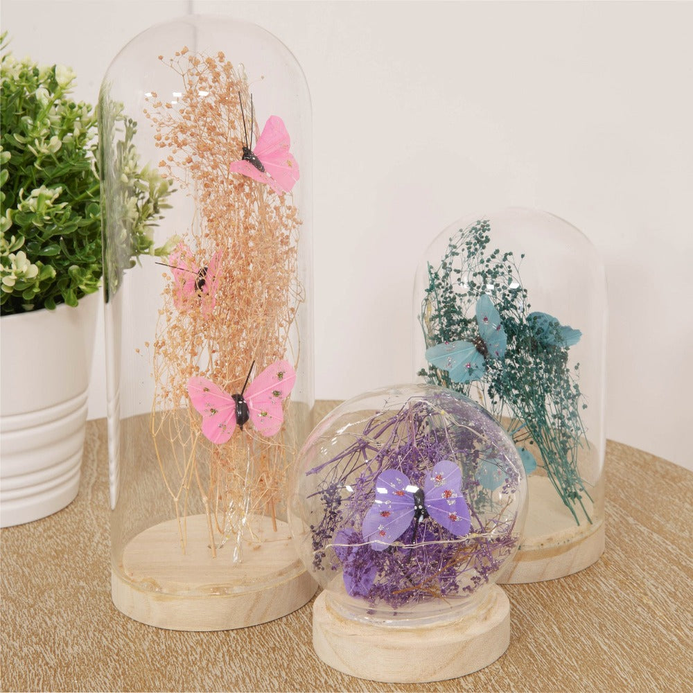 HESTIA LED Light Up Glass Dome Pink Butterfly  Create a colourful glow and bring some life to your home with this large LED light up butterfly dome ornament. From the Nature Trail collection by HESTIA® - bring some subtle Spring vitality to your home.