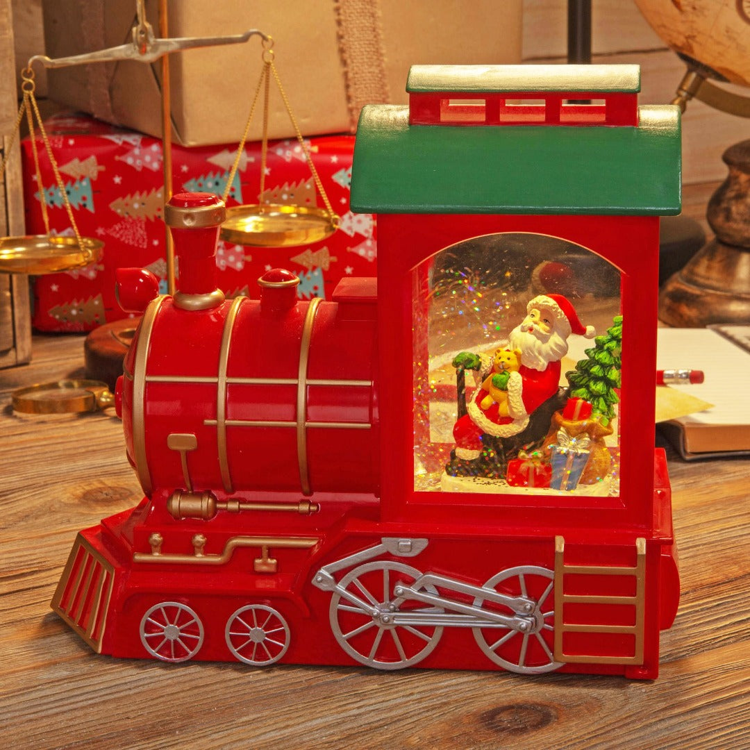 LED Santa Express Train Snow Globe  Add an extra special flourish of festive magic to a Christmas display with this large LED light up steam train glitter snowglobe. From the North Pole Novelties Co. by Santa's Workshop - the one stop shop for Christmas cheer!
