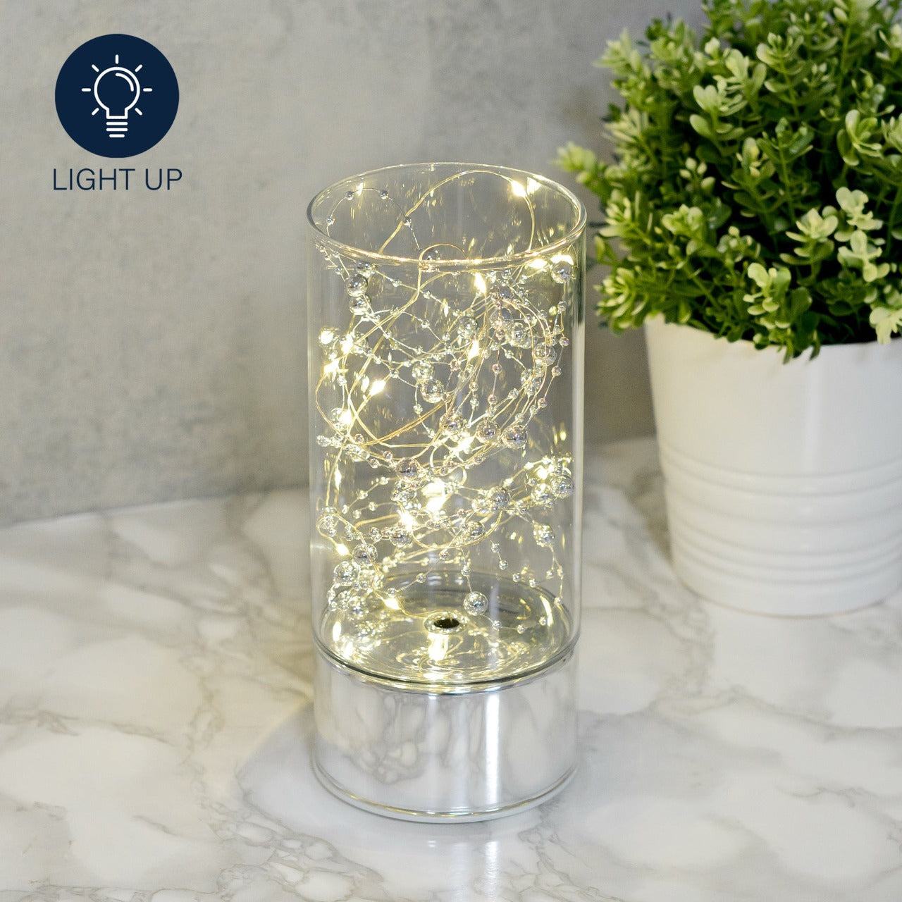 LED Tube Light 20cm Tall  Bring some contemporary shimmer to your home with this elegant silver glass light tube. From the Silver Luxe collection by HESTIA® - unparalleled glamour, style and elegance in contemporary home and gift.