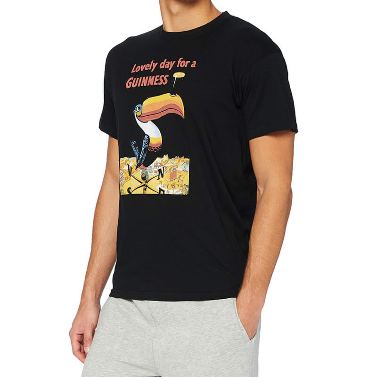 Lovely Day for a Guinness Toucan T-Shirt Black  Lovely Day for a Guinness Toucan T-Shirt. Made of 100% cotton, this T-shirt is not only extremely durable and resistant to moisture but also soft, breathable, and a great insulator - the perfect shirt to wear all year round while looking stunning.