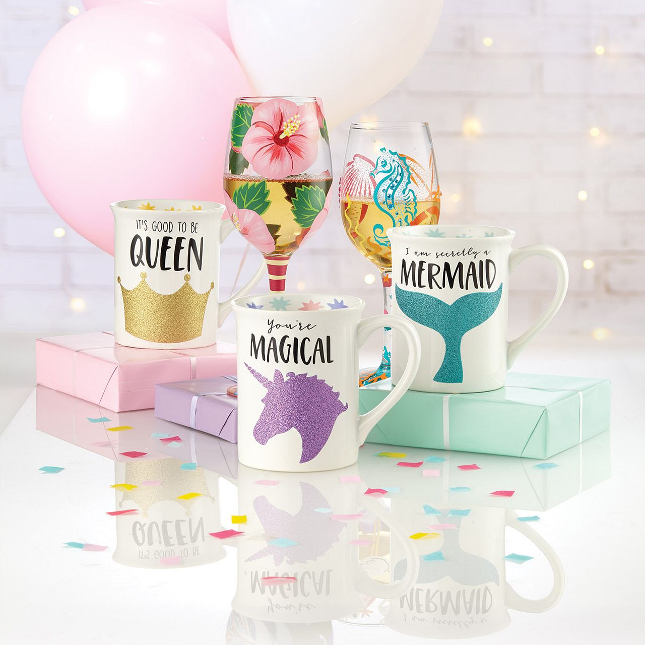 Magical Unicorn Glitter Mug  Always be yourself, unless you can be a unicorn. Then, be a unicorn. Unicorn lovers can show off just how magical they are with this whimsical, magical, mystical mug featuring a purple sparkling unicorn and pastel stars lining the inside rim. Messaging reads: "You're Magical," "Unicorns are awesome, I am awesome, therefore I am a unicorn".