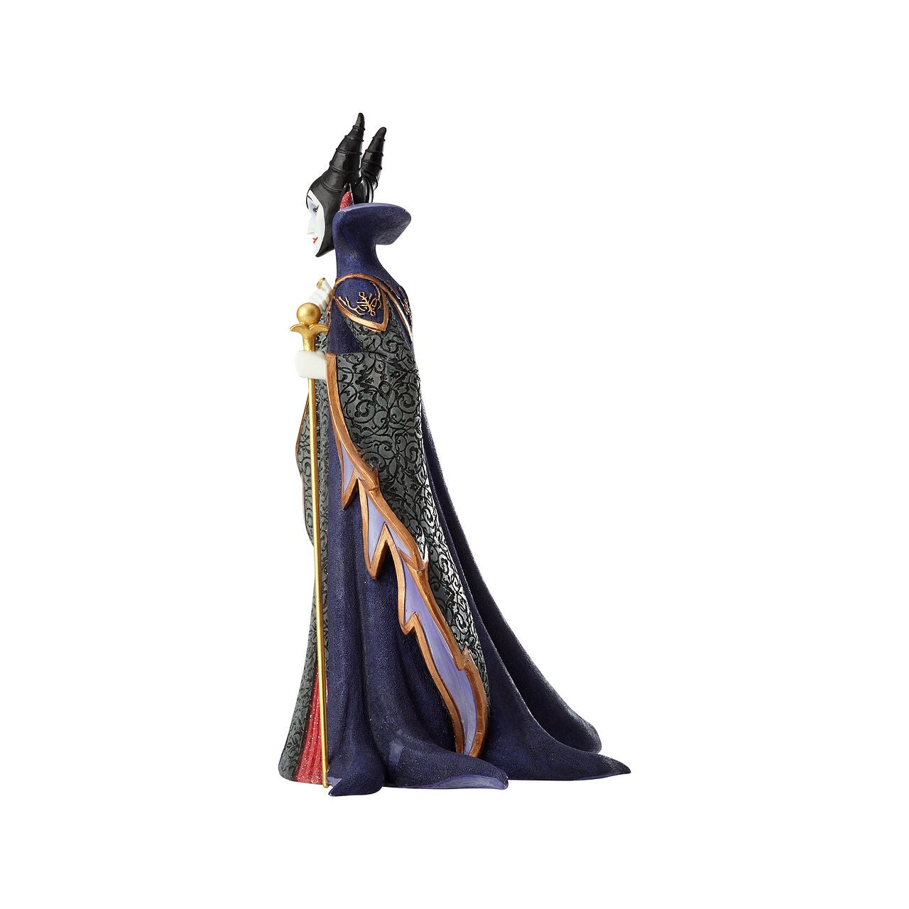 Disney Maleficent Figurine  Maleficent strikes a regal pose in this handcrafted design from the Haute Couture collection, her ominous onyx robes reimagined as a satin gown and feathered, floor-length cape. Ready to rule the runway, the fashionable figure holds a golden scepter.