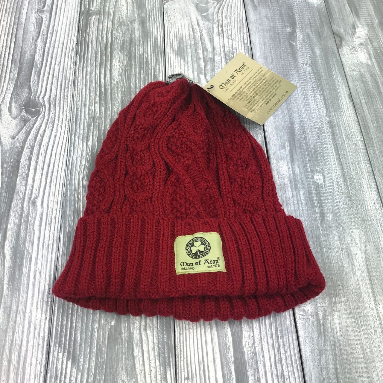Man of Aran Lambay Beanie - Maroon  Man of Aran range is inspired by the beauty of the rugged Irish Landscape. We have created this collection to present everything that it means to be Irish. Our designs have been inspired by Irish craft skills passed down through generations to create.