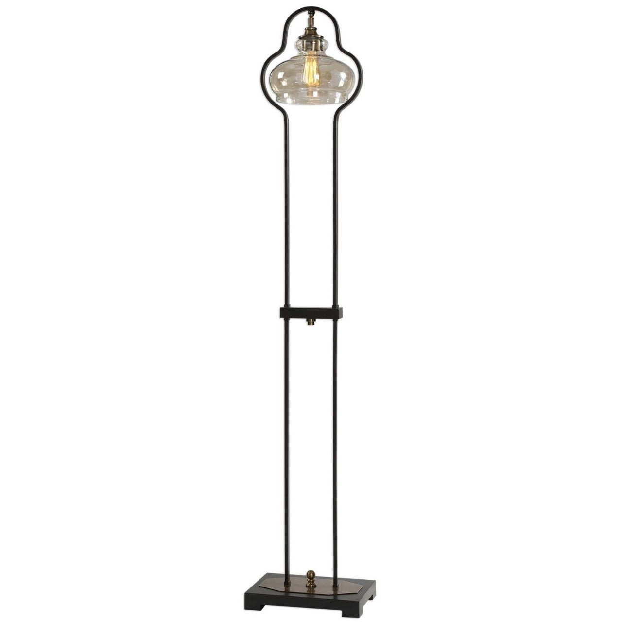 Mindy Brownes Cotulla Lamp  Curvaceous forged iron finished in an aged black, following the contour of the light amber glass shade, accented with brushed, antiqued brass plated details. 60 watt, BT-58 antique style bulb included.