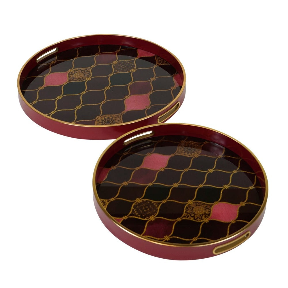 Mindy Brownes Haralson Trays Set of 2  A stunning set of two circular trays, with a rich red surround, gold rim and black interior, finished with a gold pattern and pops of pink and rich red colours.