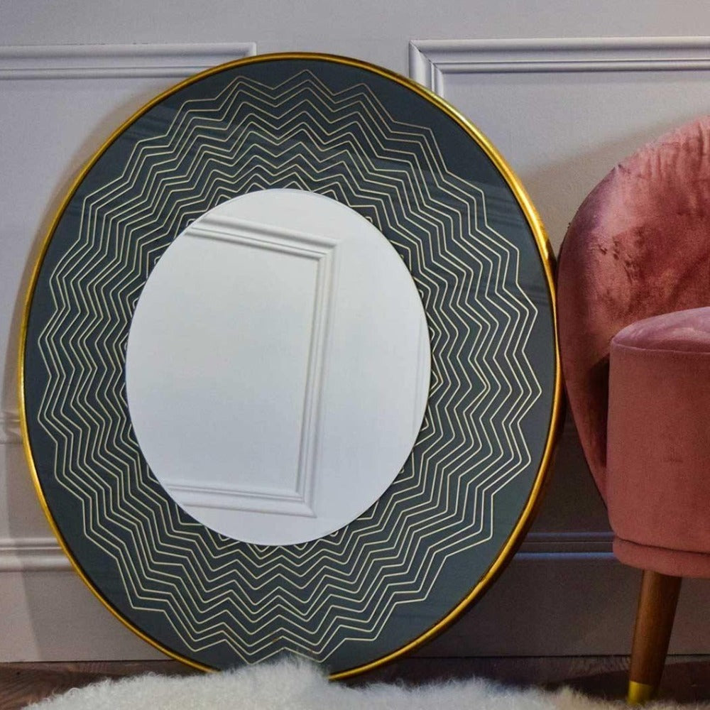 Mindy Brownes Liana Mirror  A powder blue mirror! Well that's trendy and fun to add to your home! Miami vibes, stylish round mirror with blue and gold geometric details. Stunning in a bathroom, children's bedroom or hallway for a pop of colour!