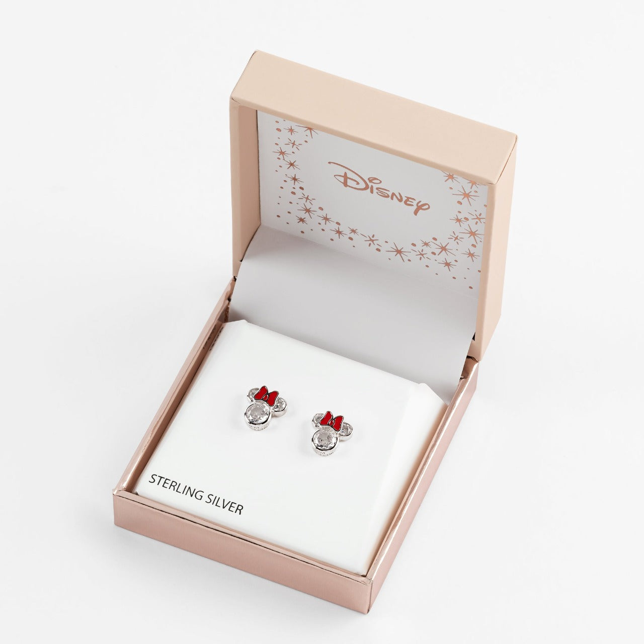 Disney Minnie Mouse Sterling Silver CZ Crystals With Red Bow Stud Earrings  Very pretty and charming Minnie Mouse shaped earrings with Cubic Zirconia stones that gives them a diamond like sparkle for a classy and sophisticated look with a beautiful bright red bow.  Trendy and fashionable design, the Disney Minnie Mouse Cz Crystal Silver Stud Earrings add a chic, fun touch to any outfit.