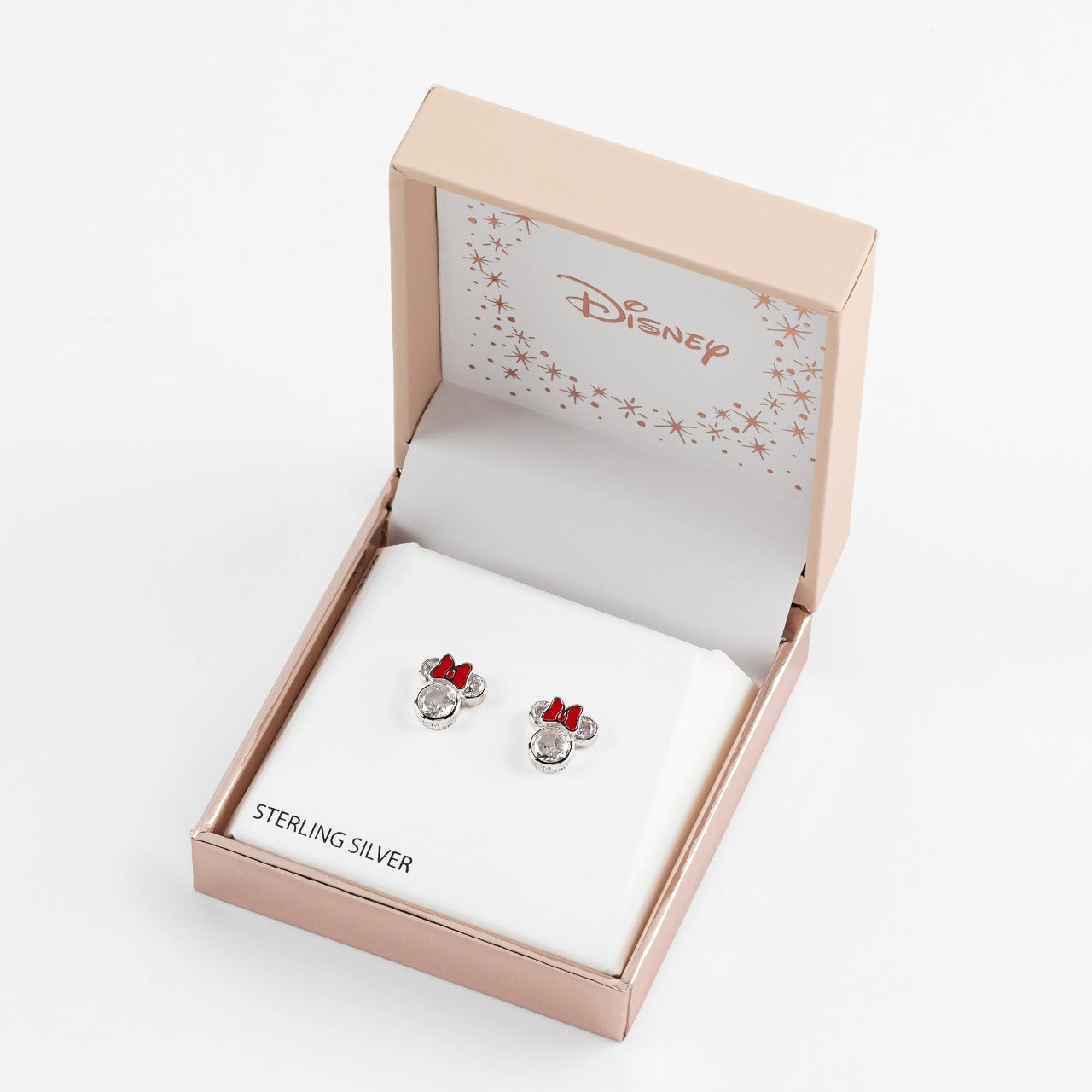 Disney Minnie Mouse Sterling Silver CZ Crystals With Red Bow Stud Earrings  Very pretty and charming Minnie Mouse shaped earrings with Cubic Zirconia stones that gives them a diamond like sparkle for a classy and sophisticated look with a beautiful bright red bow.  Trendy and fashionable design, the Disney Minnie Mouse Cz Crystal Silver Stud Earrings add a chic, fun touch to any outfit.