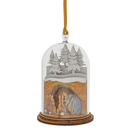 Mrs. Rabbit in Burrow Wooden Hanging Ornament  This charming Mrs. Rabbit wooden hanging ornament has been intricately created and comes encased in a beautiful eco-friendly glass dome. This classic vintage style helps bring to life the original illustrations from the Beatrix Potter stories.