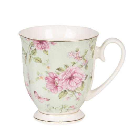 Clayre & Eef Country Style Green Pink Porcelain Flowers Mug  This Country Style Green Pink Porcelain Flowers Mug comes from Clayre & Eef, renowned for their high-quality materials and elegant yet unique design.