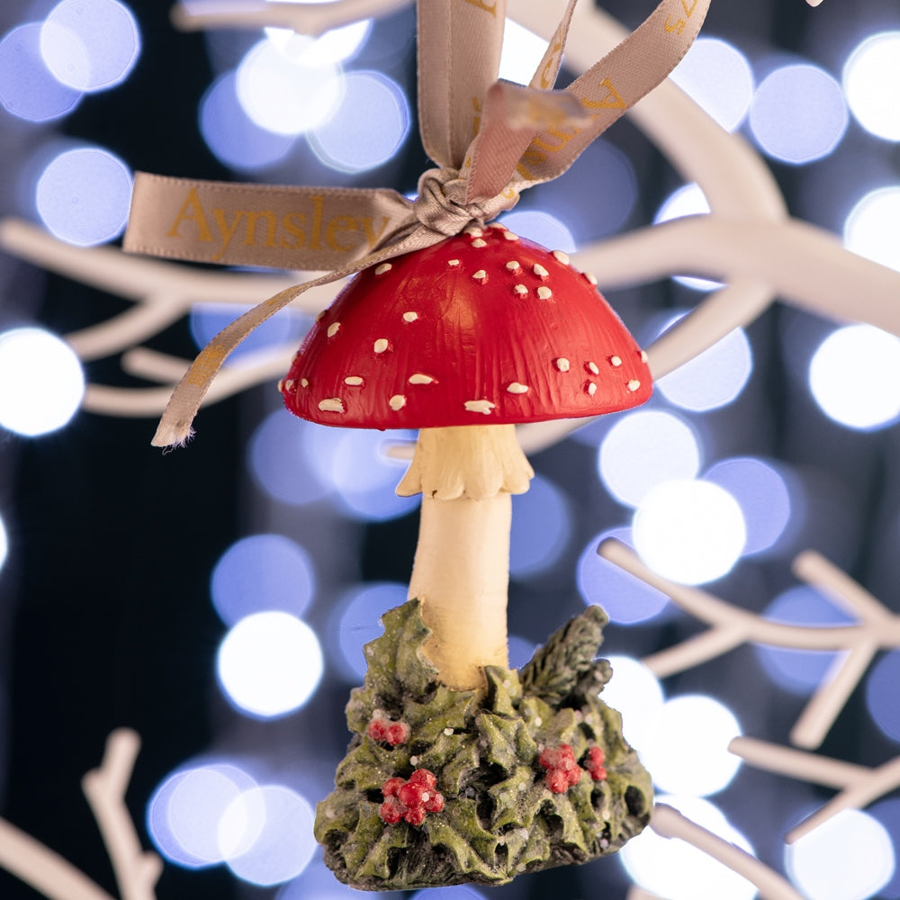 Christmas Mushroom & Holly Hanging Ornament  Festive woodland meets quirky Christmas charm, this gorgeously detailed ornament is packed with fun and jolly festive delight. This Ornament is presented in a beautiful gift box, and tied with a branded ribbon.