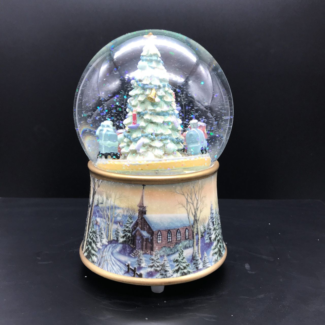 Music Box World Snow Globe Christmas Tree with Train  Featuring festive scenes and characters, add charm and personality to your home this Christmas with our fabulous snow globes