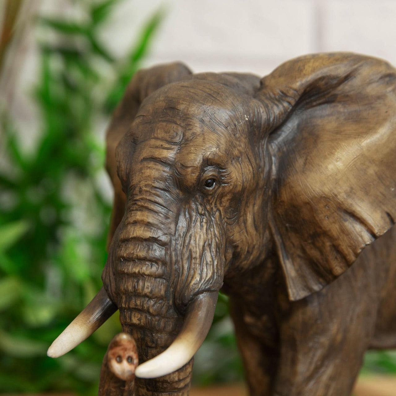 Elephant Figurine 23cm - Naturecraft Collection  An intricately hand painted resin elephant figurine. From Naturecraft - the one stop shop for wildlife enthusiasts.