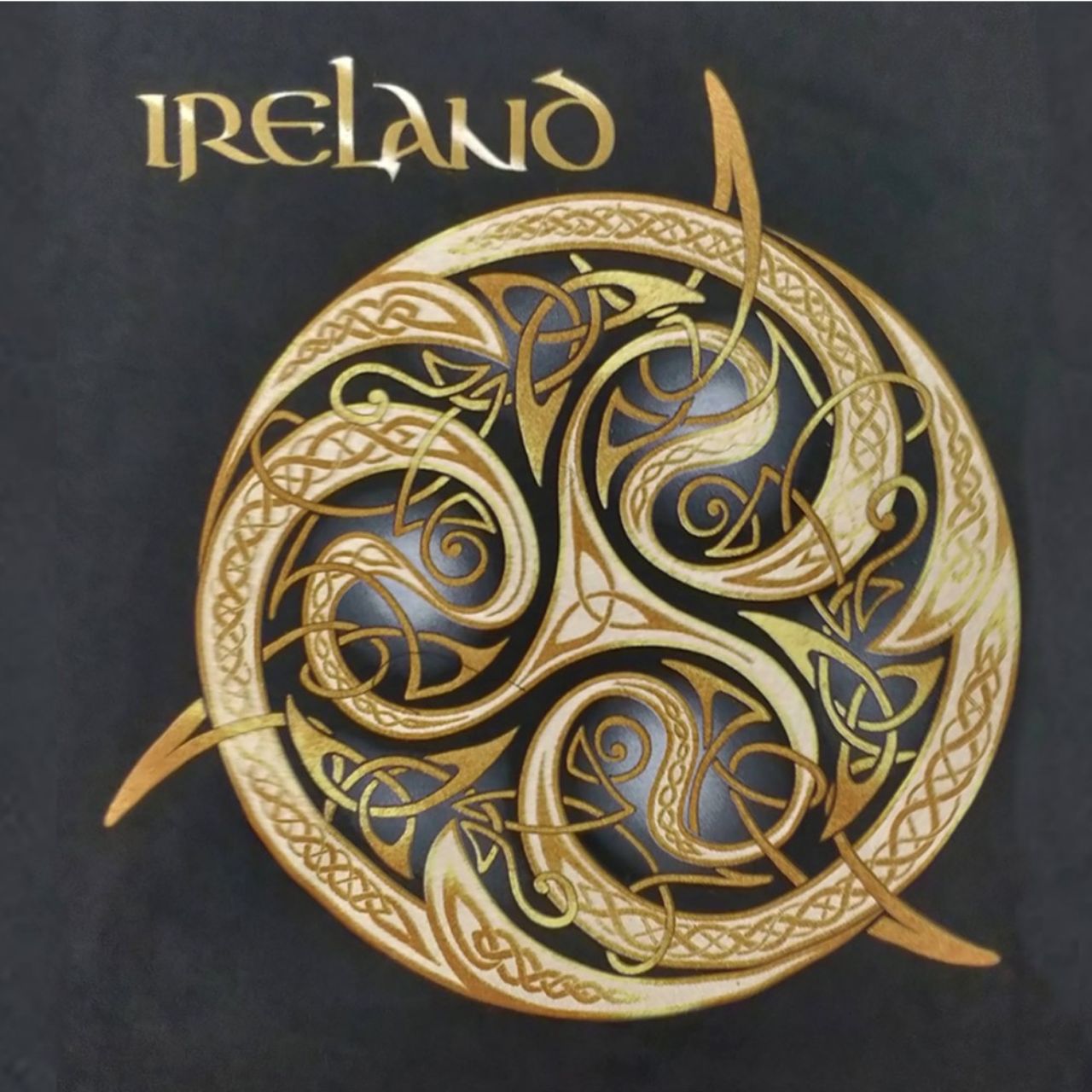 Navy Celtic Knot T-Shirt  Navy cotton T-shirt is a part of the Traditional Craft Official Collection. It s a relaxed fit and features a large gold gradient print of a detailed Celtic knot and a small Ireland logo.