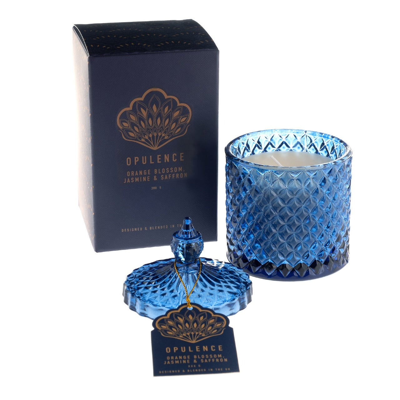 Opulence Orange Blossom, Jasmine & Saffron 200g Candle  Inspired by the grace and unique beauty of the peacock, Opulence guarantees a majestical and serene Christmas. With contemporary bold night colours and embellished gold foils, these luxury gifts bring the fairy tale fantasy to life with their decorative textures and dazzling style.