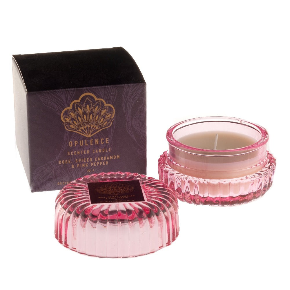 Opulence Rose, Spiced Cardamom & Pink Pepper Candle  Inspired by the grace and unique beauty of the peacock, Opulence guarantees a majestical and serene Christmas. With contemporary bold night colours and embellished gold foils, these luxury gifts bring the fairy tale fantasy to life with their decorative textures and dazzling style.
