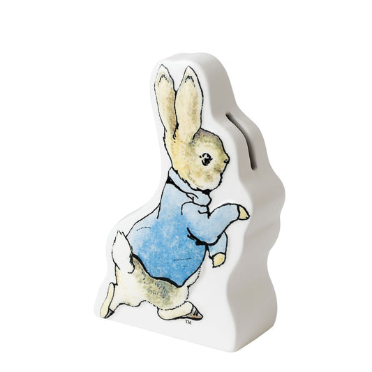 Beatrix Potter Peter Rabbit Running Money Bank  Encourage little ones to look after those precious pennies, with their very own Peter Rabbit money bank. This wonderful money bank would be ideal for a children's gift, christening gift, or even for a special birthday.