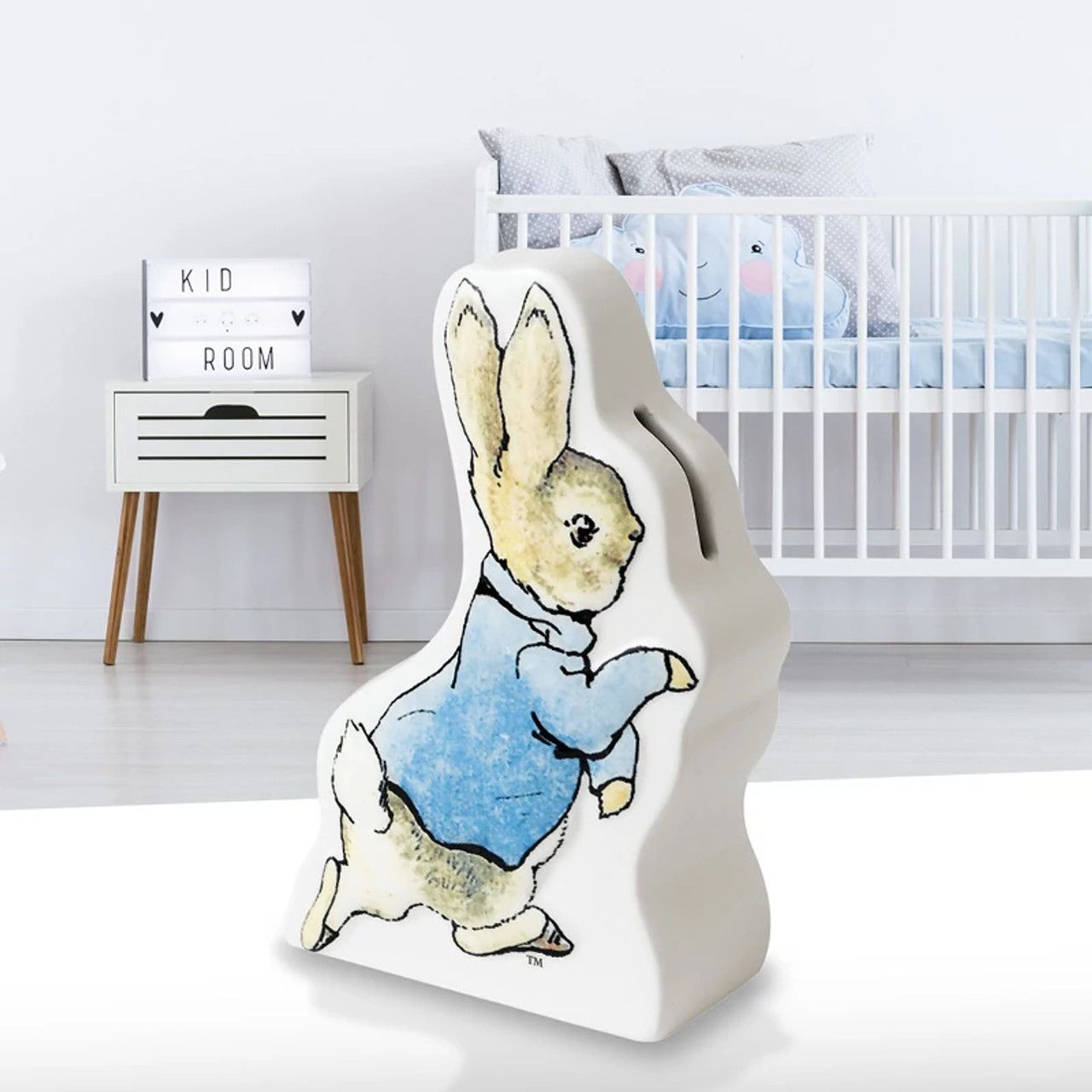 Beatrix Potter Peter Rabbit Running Money Bank  Encourage little ones to look after those precious pennies, with their very own Peter Rabbit money bank. This wonderful money bank would be ideal for a children's gift, christening gift, or even for a special birthday.