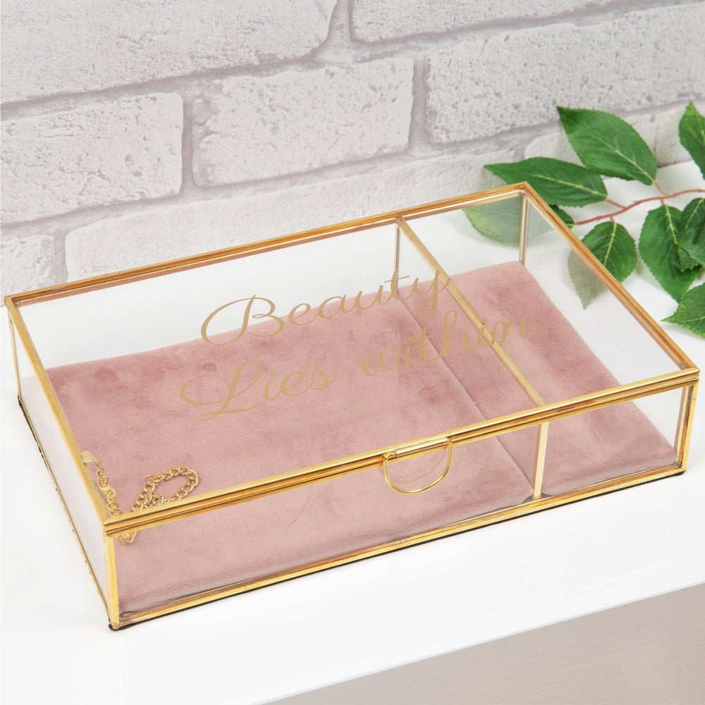 HESTIA Pink Trinket Box - Beauty Lies Within  An elegant glass and gold metal jewellery box with pink velveteen cushioned interior. From the Nature Trail collection by HESTIA® - bring some subtle Spring vitality to your home. The lid features a gold foil script title - Beauty Lies Within. So fill with sparkling, twinkling things.