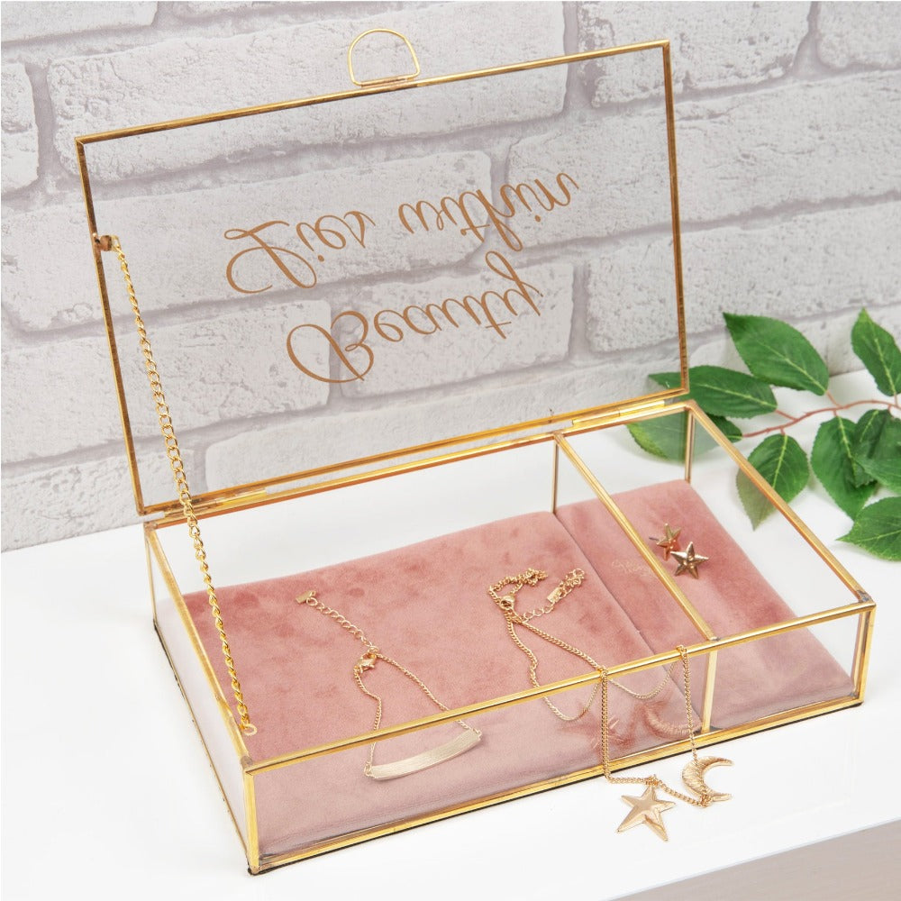 HESTIA Pink Trinket Box - Beauty Lies Within  An elegant glass and gold metal jewellery box with pink velveteen cushioned interior. From the Nature Trail collection by HESTIA® - bring some subtle Spring vitality to your home. The lid features a gold foil script title - Beauty Lies Within. So fill with sparkling, twinkling things.