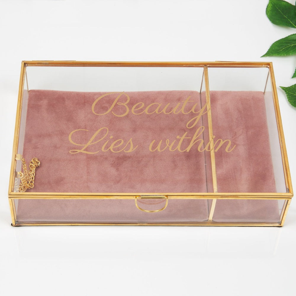 HESTIA Pink Trinket Box - Beauty Lies Within  An elegant glass and gold metal jewellery box with pink velveteen cushioned interior. From the Nature Trail collection by HESTIA® - bring some subtle Spring vitality to your home. The lid features a gold foil script title - Beauty Lies Within. So fill with sparkling, twinkling things.