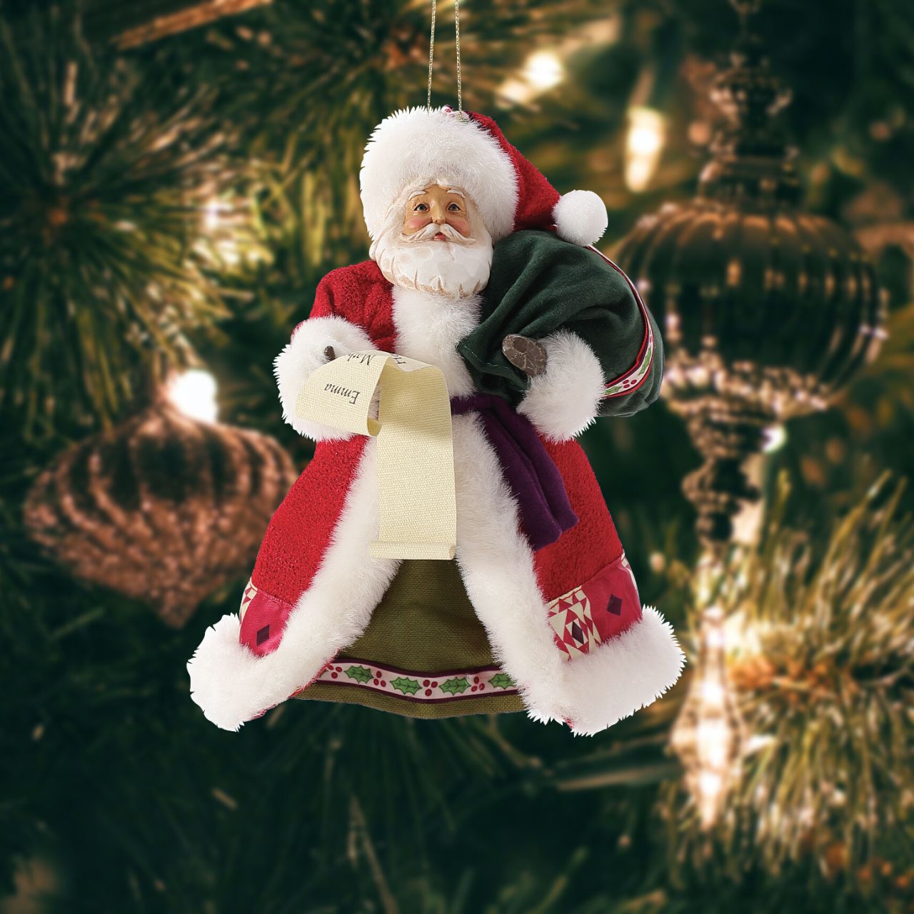Jim Shore Limited Edition Santa Hanging Ornament  Designed by Jim Shore for Possible Dreams, this Santa ornament is dressed in Clothtique fabrics and fur. Limited Edition Ornament