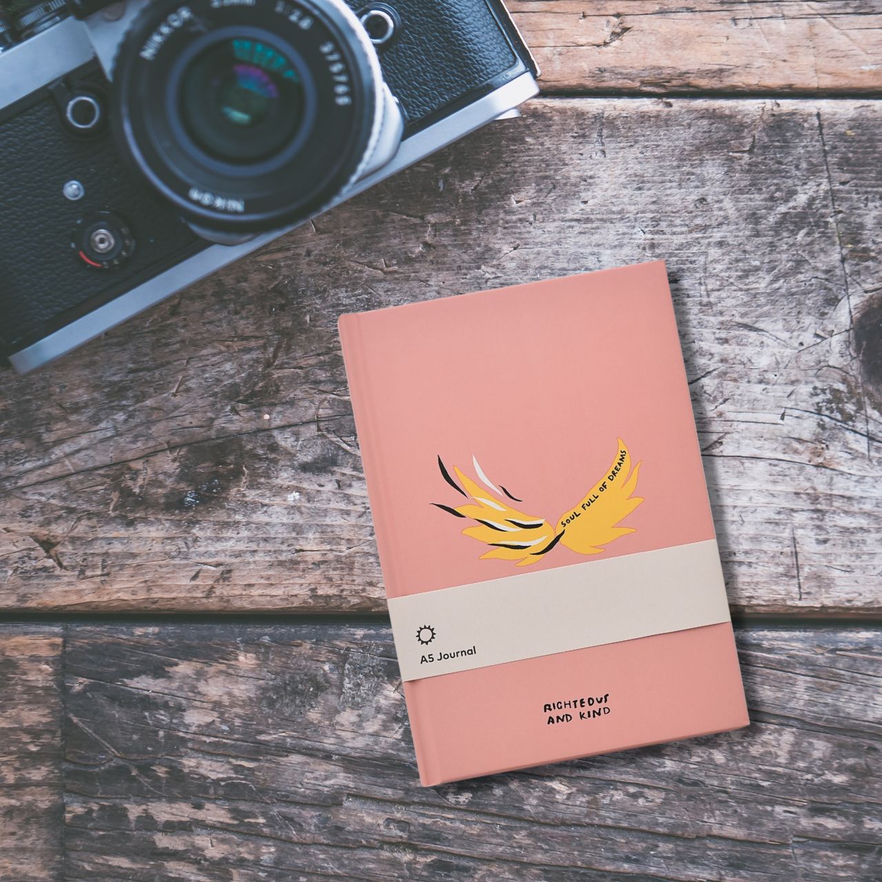 Righteous & Kind A5 Wings Journal  A stylish notebook that would make a beautiful gift for those who love to note down their thoughts or doodle. With a gold wing design, this would make a cute addition to any free spirit's stationary collection.