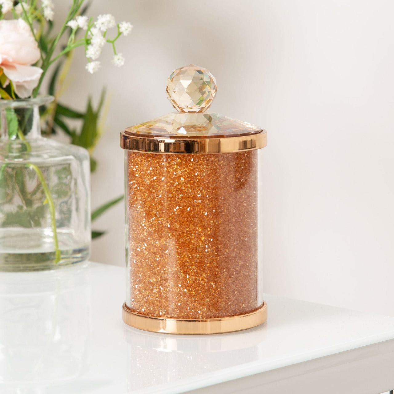 Estella Rose Gold Glass & Crystal Trinket Box  Store those bits and bobs, jewellery or keepsakes in style with this rose gold metal, champagne glass and amber crystal trinket box. From Estella by SOPHIA® - Champagne Chic women's home and gift evoking the luxurious spirit of the art deco era.